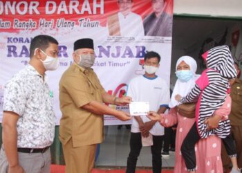 Bupati Tanjab Barat Hadiri Acara Pengobatan Gratis Dan Donor Darah