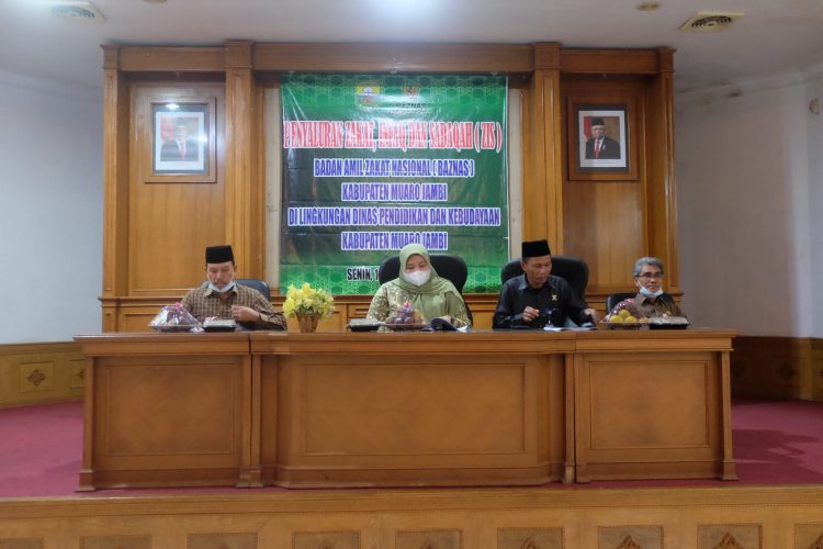 Bupati Masnah Hadiri Acara Peyaluran Zakat Infaq, dan Sodaqoh Baznas Kabupaten Muaro Jambi