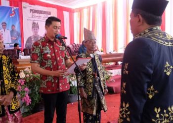 Pj Bupati Muaro Jambi Hadiri Pengukuhan LAM Desa, Kepala Desa Tanjung Dan Desa Panca Mulia