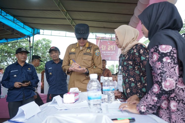 PJ Bupati Muaro Jambi Tinjau Tempat Pemungutan Suara (TPS)