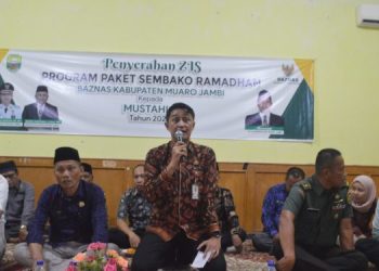 Pj Bupati Hadiri Acara Penyerahan Program Paket Sembako Ramadhan BAZNAS Kabupaten Muaro Jambi